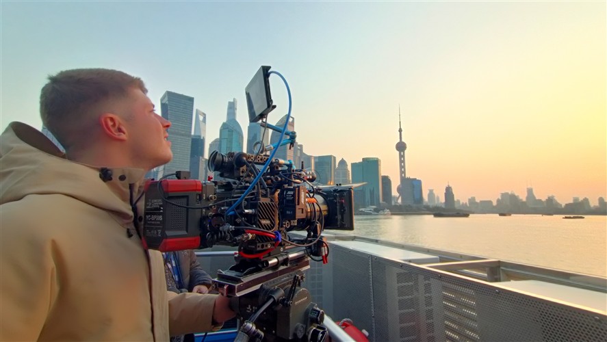 Director of photography setup on the Bund with Shanghai skyline behind