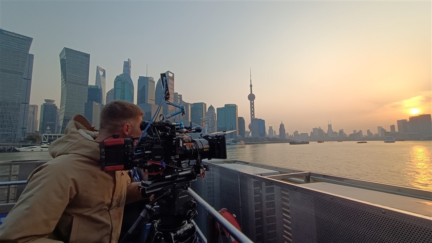 Camera setup overlooking the Shanghai skyline at dusk