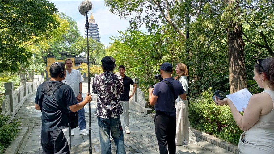 Documentary interview crew working in a Shanghai outdoor location