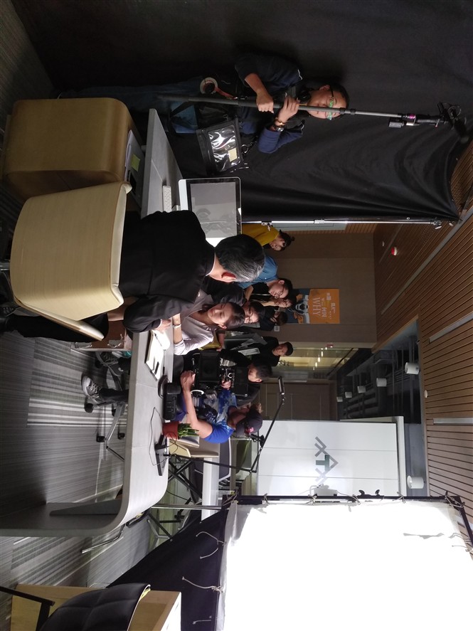 Production support team managing an interview-led shoot in Shanghai