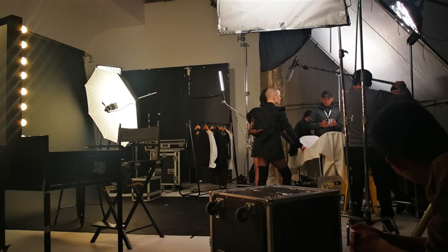 Commercial production set in Shanghai with lighting and client-facing crew structure