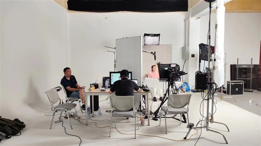 Shanghai equipment setup with camera, monitor and lighting in a controlled studio environment